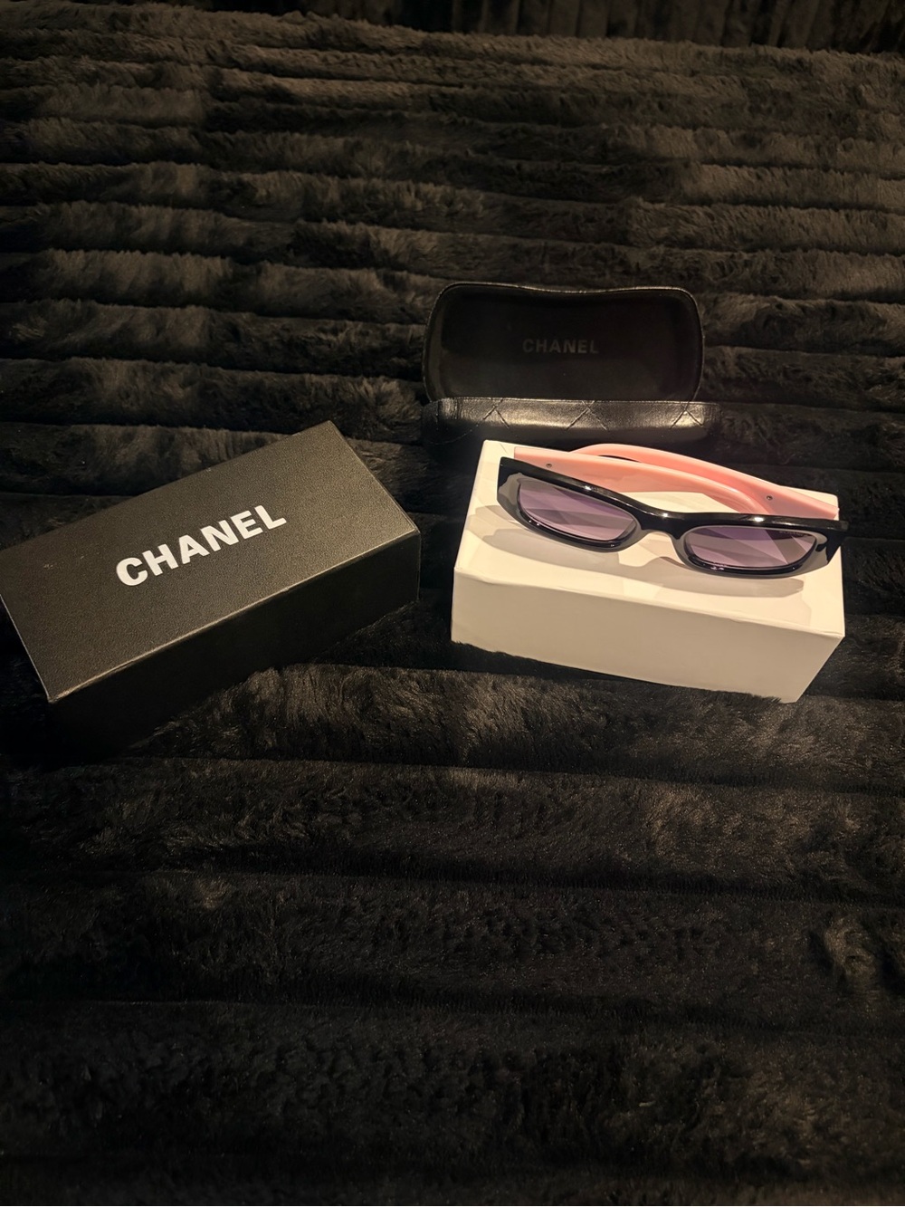 CHANEL Black Frame Sunglasses with Pink Temples and Purple Lenses